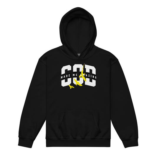 Youth hoodie with bold white lettering “God Made Me Amazing” and yellow bird design, providing warmth and inspiration in faith and confidence.